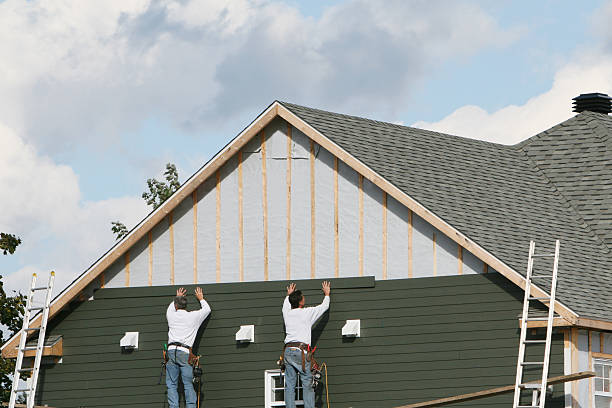 Professional Vinyl Siding technician working in Turbotville, PA